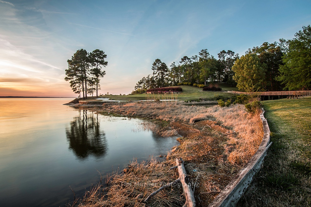 Sunset near the 17th-hole at Cypress Bend Golf Resort and Conference Center. Toledo Bend Forest Scenic Byway on Louisiana Highway 191 travels beside Toledo Bend Reservoir. The southern end of of the 76-mile byway starts at the reservoir dam, goes north through Sabine Parish and ends 20-miles into DeSoto Parish at Logansport and Hwy 84.