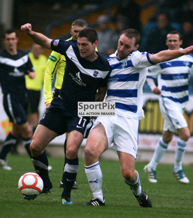 Iain Vigurs ross coujnty tussles with Grant Evans Morton in the irn bru first division clash at cappielow greenock ross count ran out winners 2-0 picture kevin mcglynn
