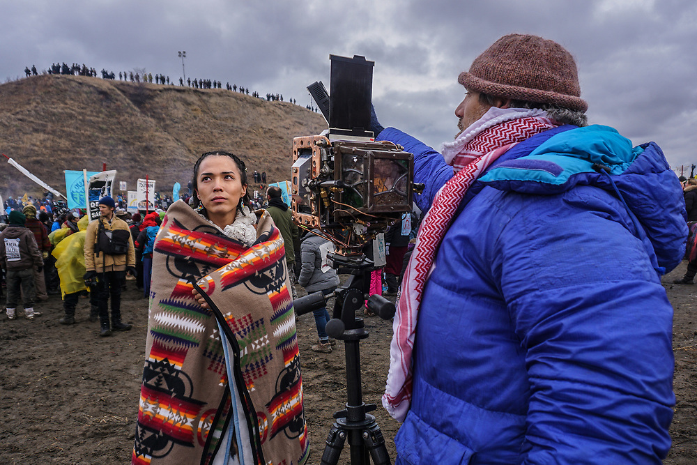 "Us & Them" photo shoot during a battle between the Standing Rock Sioux Water Protectors and the Sheriffs Dept, National Guard, and Dakota Access Pipeline hired guns. <br />
<br />
The woman in the photo is from the Navajo Nation.