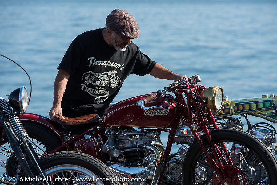 Skateboarding legend Steve Caballero with his Bryan Thompson (Thompson Cycle) built 1952 Pre-unit custom Triumph at the Yokohama docks where bikes from invited USA custom builders were unloaded prior to the Mooneyes Yokohama Hot Rod & Custom Show. Yokohama, Japan. December 3, 2016. Photography ©2016 Michael Lichter.