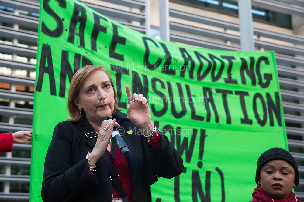 London, UK. 17 October, 2019. Emma Dent Coad, Labour MP for the Grenfell-constituency of Kensington, joins campaigners from Fuel Poverty Action (FPA), residents in uninsulated homes and climate activists to deliver a letter signed by FPA, 80 organisations, trade unions and MPs in just ten days to the Ministry of Housing, Communities and Local Government (MHCLG) precisely one year after a strongly worded letter about the urgency of recladding flammable buildings and insulating those that are cold was delivered to the government department. Commitments made by MHCLG in response to the original letter have not been met. Credit: Mark Kerrison/Alamy Live News