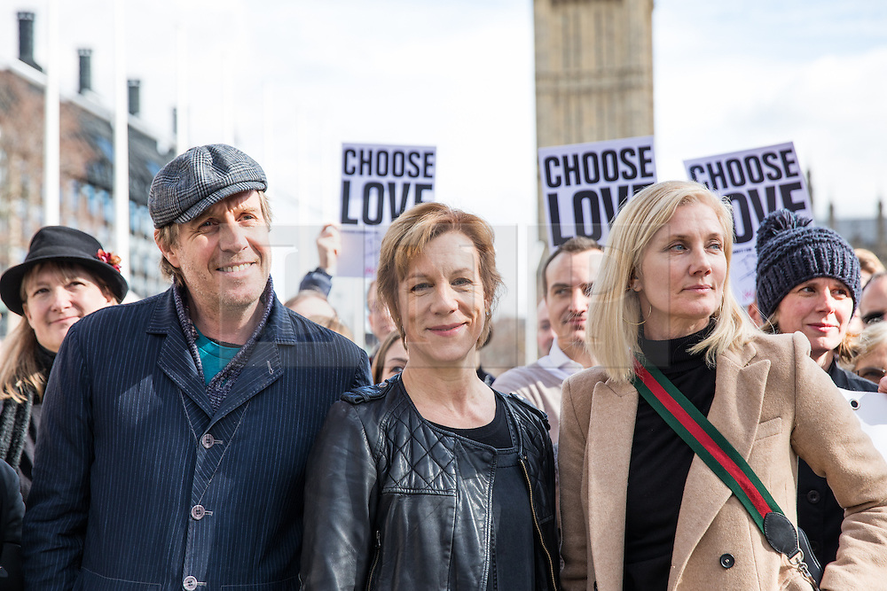 © Licensed to London News Pictures. 07/03/2017. London, UK. Actor Rhys Ifans (L), actress Juliet Stevenson (C) and actress Joely Richardson (R) join campaigners in Parliament Square to call on the government to reinstate the Dubs amendment. The Dubs Amendment, which was introduced by Lord Dubs who was brought to Britain as a child on the Kindertransport and aims to bring child refugees to safety in Britain, was suspended by the government in February 2017. Photo credit: Rob Pinney/LNP