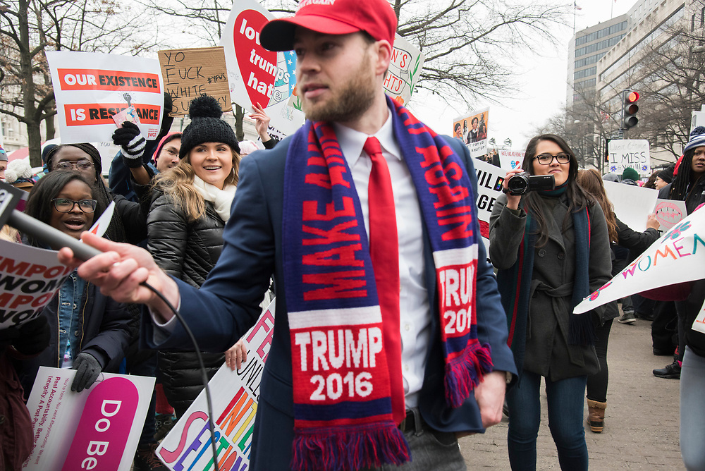 Demonstrators hold signs during the third annual Women's March in Washington, D.C., U.S., on Saturday, Jan. 19, 2019. Photographer: Melissa Lyttle/Bloomberg