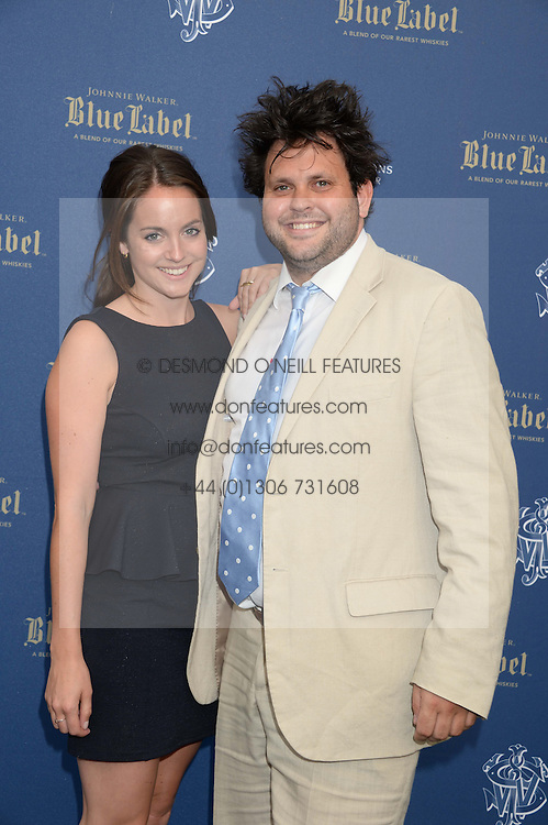 The Johnnie Walker Blue Label and David Gandy Drinks Reception aboard John Walker & Sons Voyager, St.Georges Stairs Tier, Butler's Wharf Pier, London, UK on 16th July 2013.<br />
Picture Shows:-Harry Cole and Romilly Dennis