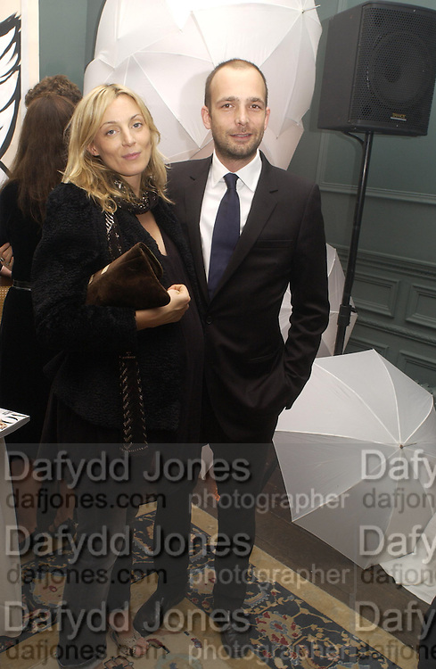 Phoebe Philo and Max Wigram, The Vogue List, celebrated by Vogue and Motorola. 33 Portland Place. 3 November 2004. ONE TIME USE ONLY - DO NOT ARCHIVE © Copyright Photograph by Dafydd Jones 66 Stockwell Park Rd. London SW9 0DA Tel 020 7733 0108 www.dafjones.com