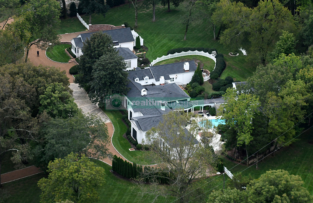 EXCLUSIVE: Aerial view of country singer Taylor Swift's historic 5601-square foot Northumberland Estate in Nashville, Tennessee. She purchased the 1934 Greek Revival estate, worth an estimated $3 million, in June 2011. It features a 5,600-square-foot main house with four bedrooms and four-and-a-half bathrooms. Out back there's a pool and a 2,000-square-foot guesthouse. The 28-year-old has a reported net worth of $280 million and huge chunk of that is parked in real estate. Swift owns more than $84 million worth of real estate across the US — eight properties in four different states, to be exact — according to estimates. As well as this country estate in Nashville, she also owns a 3,240-square-foot condo in Nashville's Music Row, which she bought at age 20. Ever the superstar, Swift also spends time in Los Angeles. She sold her Beverly Hills Cape Cod-style cottage of 2,826 square feet for $4 million earlier this year, but she still owns two more residences in the area — at least, for now. Her 2,950-square-foot Beverly Hills home is currently on the market; its value is estimated at $2.85 million. She also has an iconic 1934 Beverly Hills mansion she purchased in September 2015. It was previously home to Hollywood film producer, Samuel Goldwyn.Worth nearly $30 million, it's the most expensive piece of property in her real estate portfolio. Across the coast, Swift owns an estate with seaside views in Watch Hill, Rhode Island, valued at $6.65 million.The seven-bedroom, nine-bathroom mansion of 12,000 square feet overlooks 700 feet of shoreline with views of Block Island Sound and Montauk Point. In 2014, Swift put her savvy real estate skills to work, purchasing two adjacent penthouses in a Tribeca building and renovating them into one large duplex penthouse of 8,309 square feet with 10 bedrooms and 10 bathrooms. It features an expansive kitchen where Swift has baked with her squad, a billiards table, and a sweeping staircase, all at an estimated value of $20.5 mi