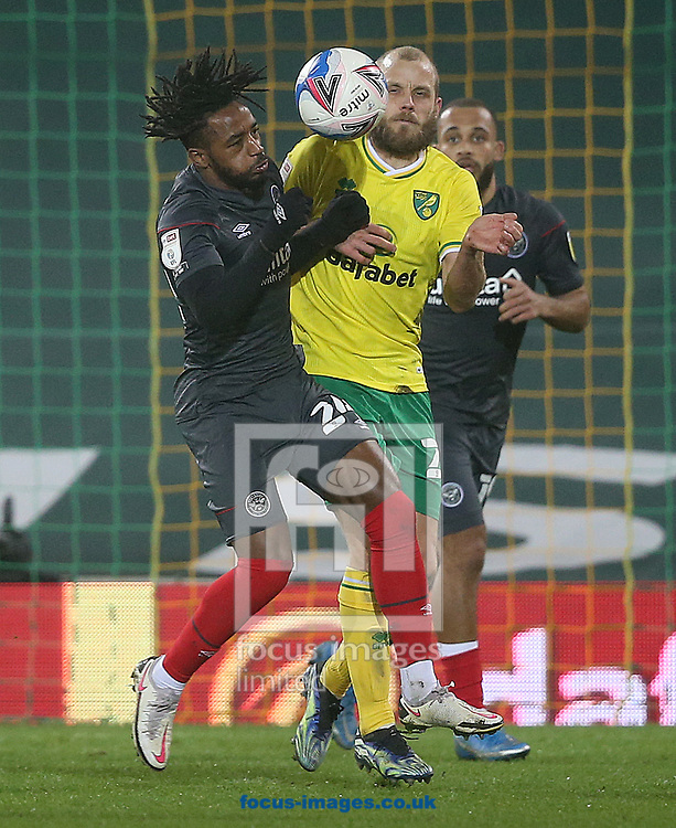 Tariqe Fosu of Brentford and Teemu Pukki of Norwich in action during the Sky Bet Championship match at Carrow Road, Norwich<br />
Picture by Paul Chesterton/Focus Images Ltd +44 7904 640267<br />
03/03/2021