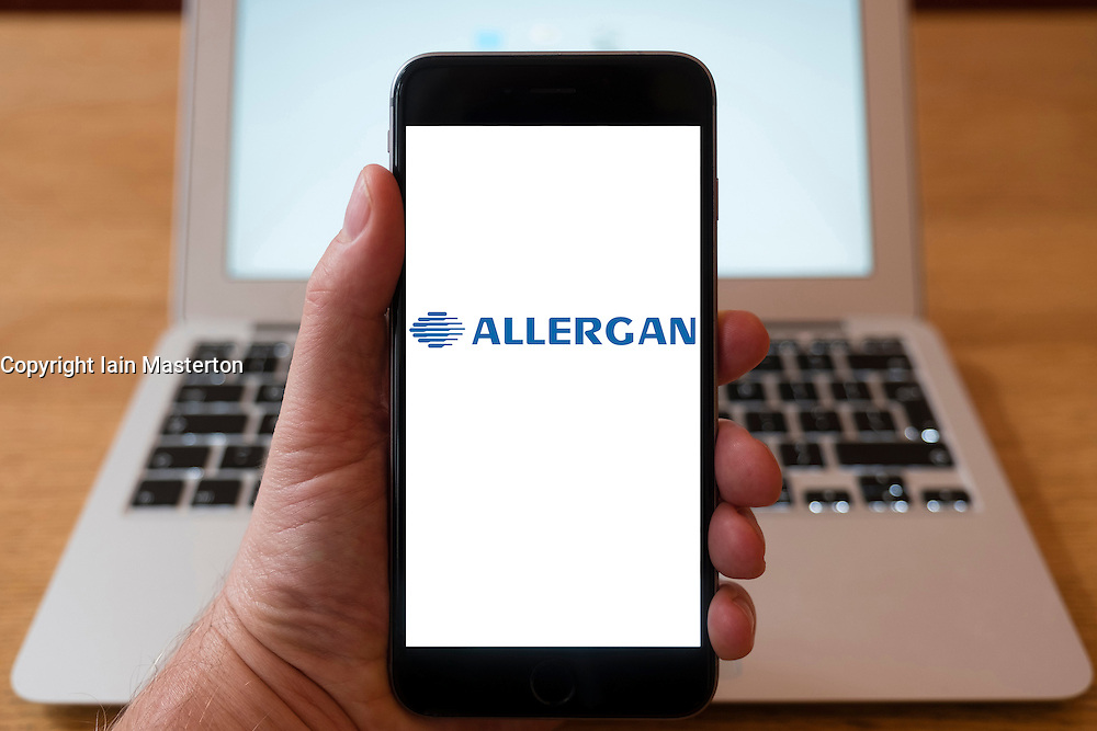 Using iPhone smartphone to display logo of Allergan global pharmaceutical company