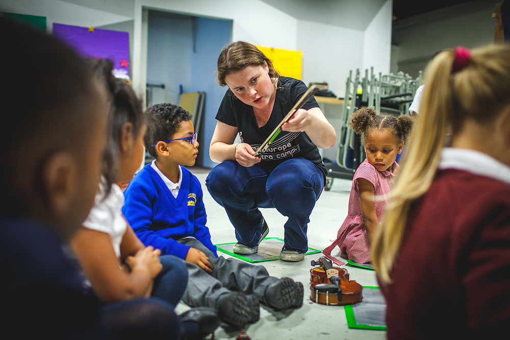 Lucy Maguire leads a rehearsal of The Nucleo Project, a programme that uses music to enrich the lives of 140+ children in West London. Children receive free music tuition and instruments, and attend at least four days a week. The Nucleo is a programme of social action through music inspired by the Venezuelan El Sistema. It is based on the principle that by striving towards musical excellence it is possible to achieve social change. London, Sep. 10, 2014 (Photos/Ivan Gonzalez)