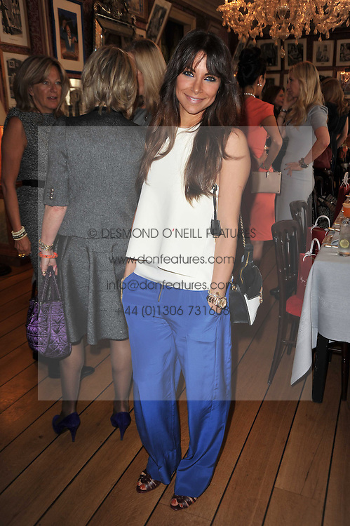 JORDANA REUBEN at a lunch hosted by Roger Viver in honour of Bruno Frisoni their creative director, held at Harry's Bar, 26 South Audley Street, London on 31st March 2011.