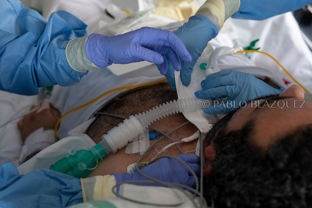 MERIDA, SPAIN - MAY 7: Healthcare staff wearing protective gear treat a COVID-19 patient at the intensive care unit of Merida Hospital as Spain works to stop the spread of the coronavirus (COVID-19) on May 7, 2020 in Merida, Spain. (Photo by Pablo Blazquez Dominguez)