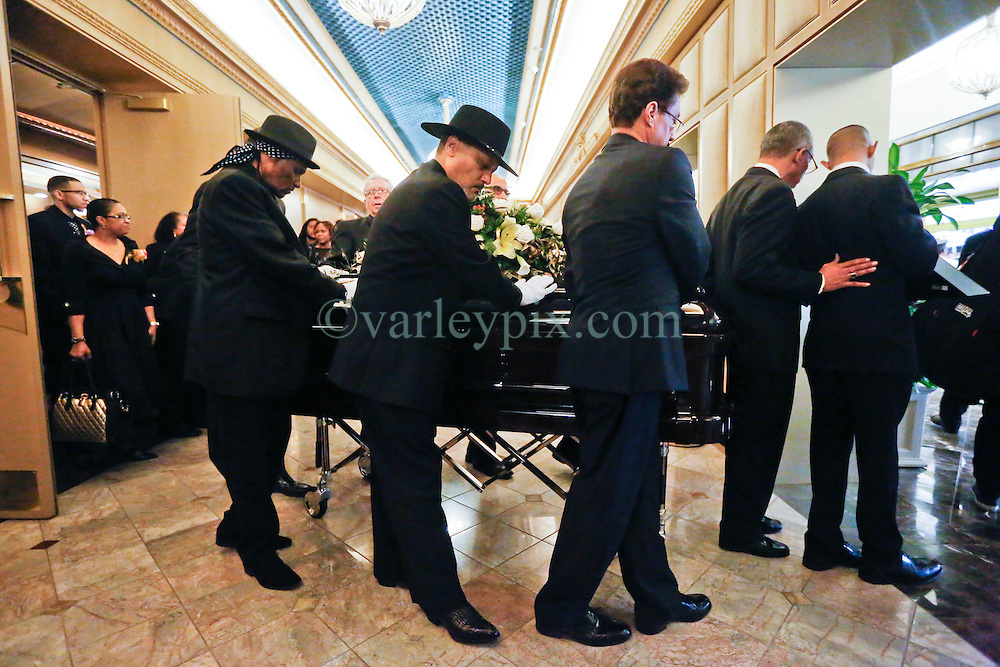20 November 2015. Orpheum Theater, New Orleans, Louisiana. <br />
Memorial service for musician Allen Toussaint. <br />
Pall bearers remove Toussaint's casket from the theater..<br />
Photo; Charlie Varley/varleypix.com