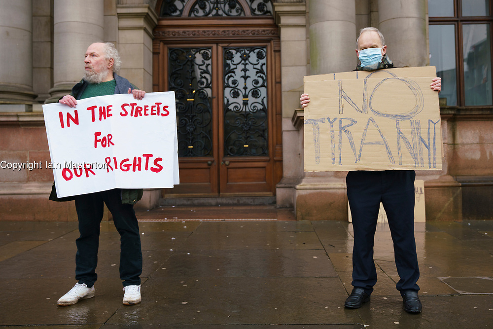 Glasgow, Scotland, UK. 7 January 2020. Anti lockdown protest outside Glasgow City Chambers led by activist Sean Clerkin. The protesters called on the Scottish Government to remove their ban on the freedom to protest and demonstrate which is contrary to articles 10 and 11 of the European Convention of Human Rights which emphasises freedom of expression and the right to demonstrate and protest. Iain Masterton/Alamy Live News