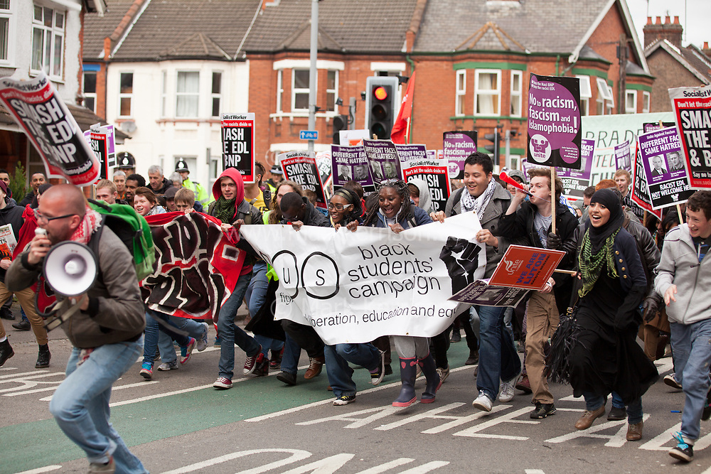 Luton, UK. 5th May, 2012. Supporters of Unite Against Fascism attend the We Are Luton/Stop The EDL march, organised by We Are Luton and Unite Against Fascism in protest against a march by around 3,000 supporters of the far-right English Defence League.