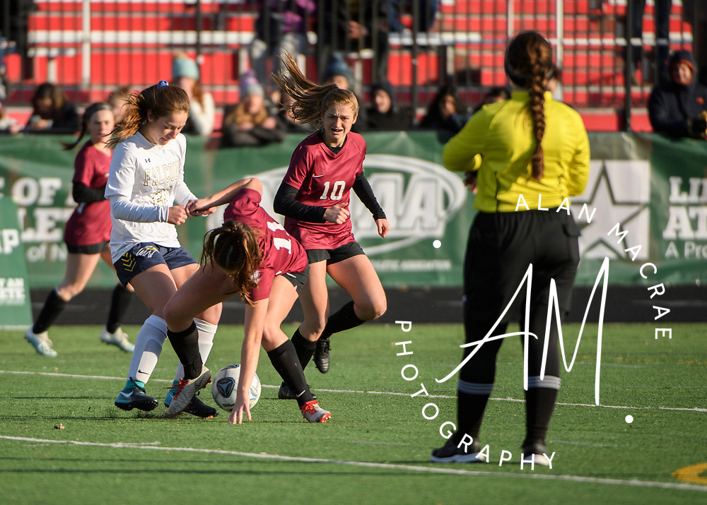 Hanover sophomore Carolyn Adams collides with Bow sophomore Madison Roberge during the NHIAA Division II soccer championship in Manchester on Sunday, November 10, 2019. (Alan MacRae/Valley News)
