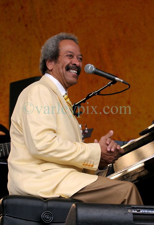 30 April 2006. New Orleans, Louisiana. Jazzfest . <br />
The first New Orleans Jazz and Heritage festival following the disaster of Hurricane Katrina. <br />
Music legend Alan Toussaint is joined by guest star Elvis Costello on the Acura stage.<br />
<br />
Photo ©Charlie Varley/varleypix.com<br />
All rights reserved.