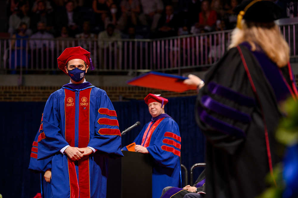 New graduates of the Dedman School of Law attend graduation, Saturday, May 15, 2021 in Moody Coliseum on the SMU Campus.