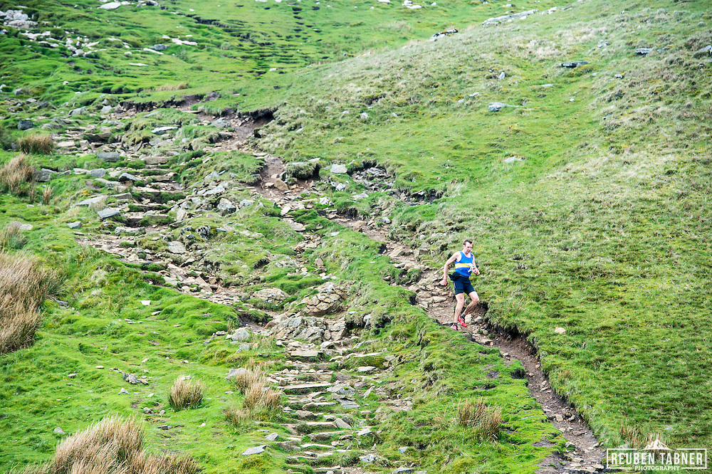 A runner makes his way through the rocks and down Ingleborough in the Yorkshire Dales during the 60th Yorkshire Three Peaks Race.