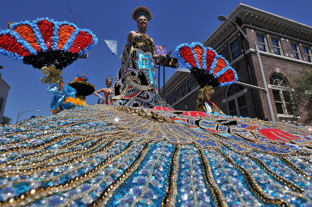 SLUG: BOF2011RJ-No Photo Request number-April 15, 2011-San Antonio, Texas---The train of Queen Alanna Miller drapes down the side of a float along Broadway St. during the Battle of Flowers parade 4/15. Photo by Robin Jerstad/Special to the Express-News