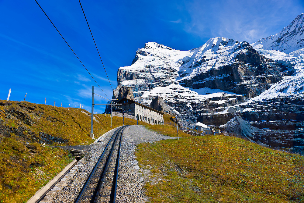 Jungfrau Railway train climbing from Kleine Scheidegg to Eigergletscher, Swiss Alps, Canton Bern, Switzerland