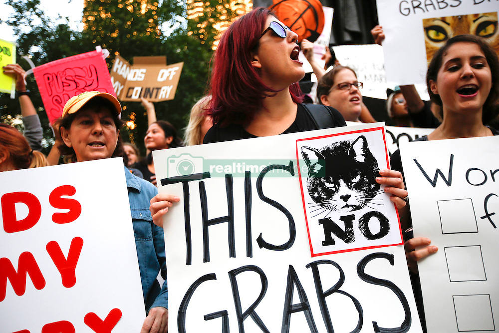 Protesters in opposition to Donald Trump's misogyny congregate and chant near the intersection of Wabash Avenue and Wacker Drive outside of Trump Tower on Tuesday, October 18, 2016 in Chicago, IL, USA. Photo by Jose M. Osorio/Chicago Tribune/TNS/ABACAPRESS.COM
